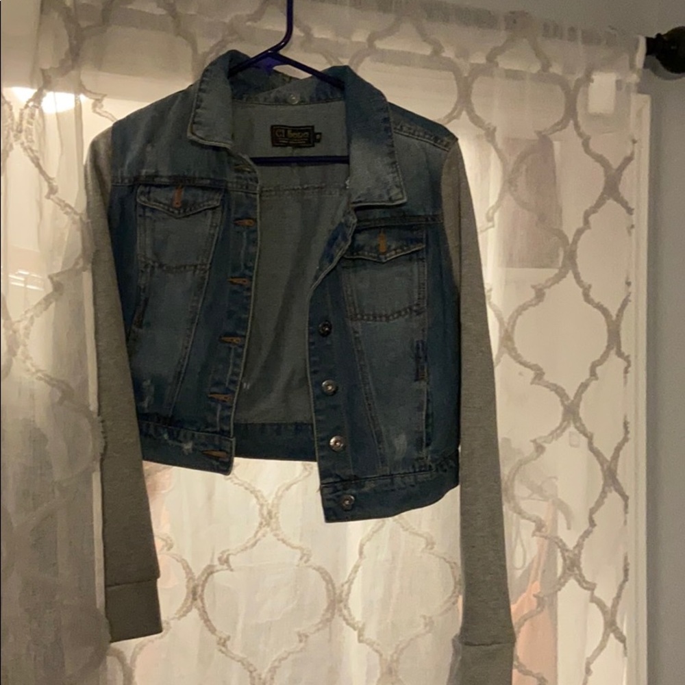 Jean jacket with sweatshirt sleeves